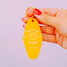 Load image into Gallery viewer, Happy To Be Here Motel Tag Keychain | Last Chance